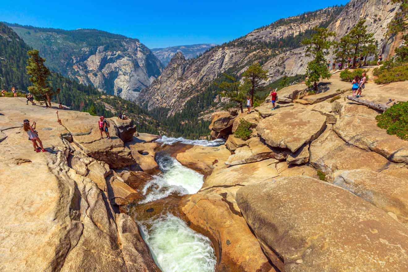 A group of people standing on rocks.