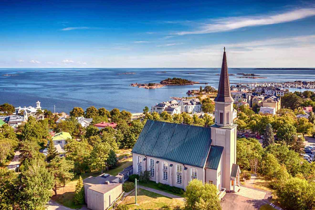 An aerial view of a church in a small town.