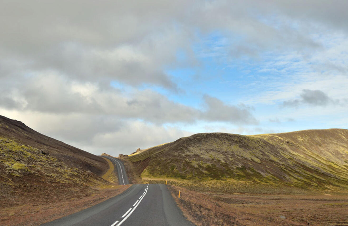 a highway leading to mountains