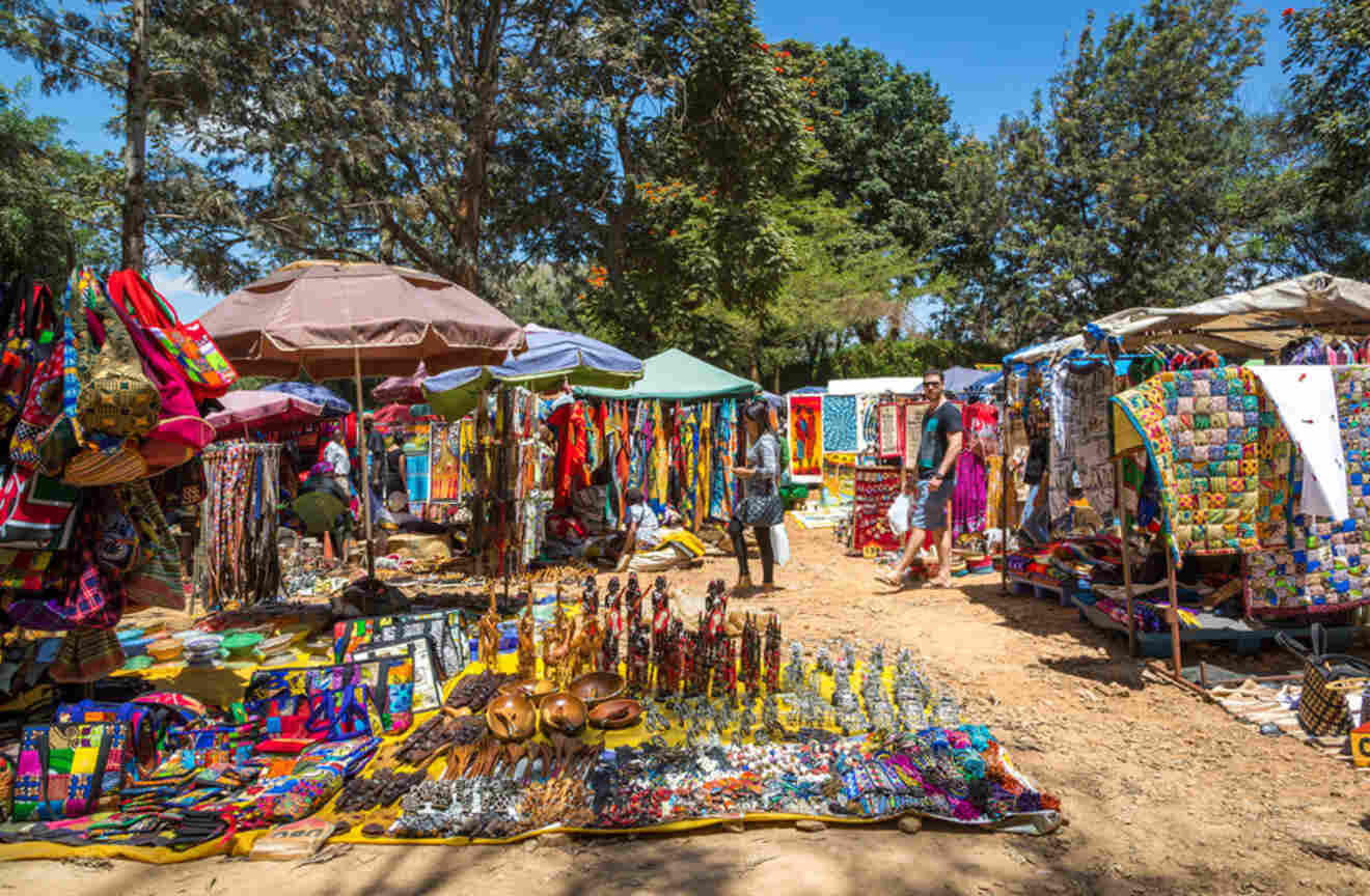 vendors selling arts and crafts at a market