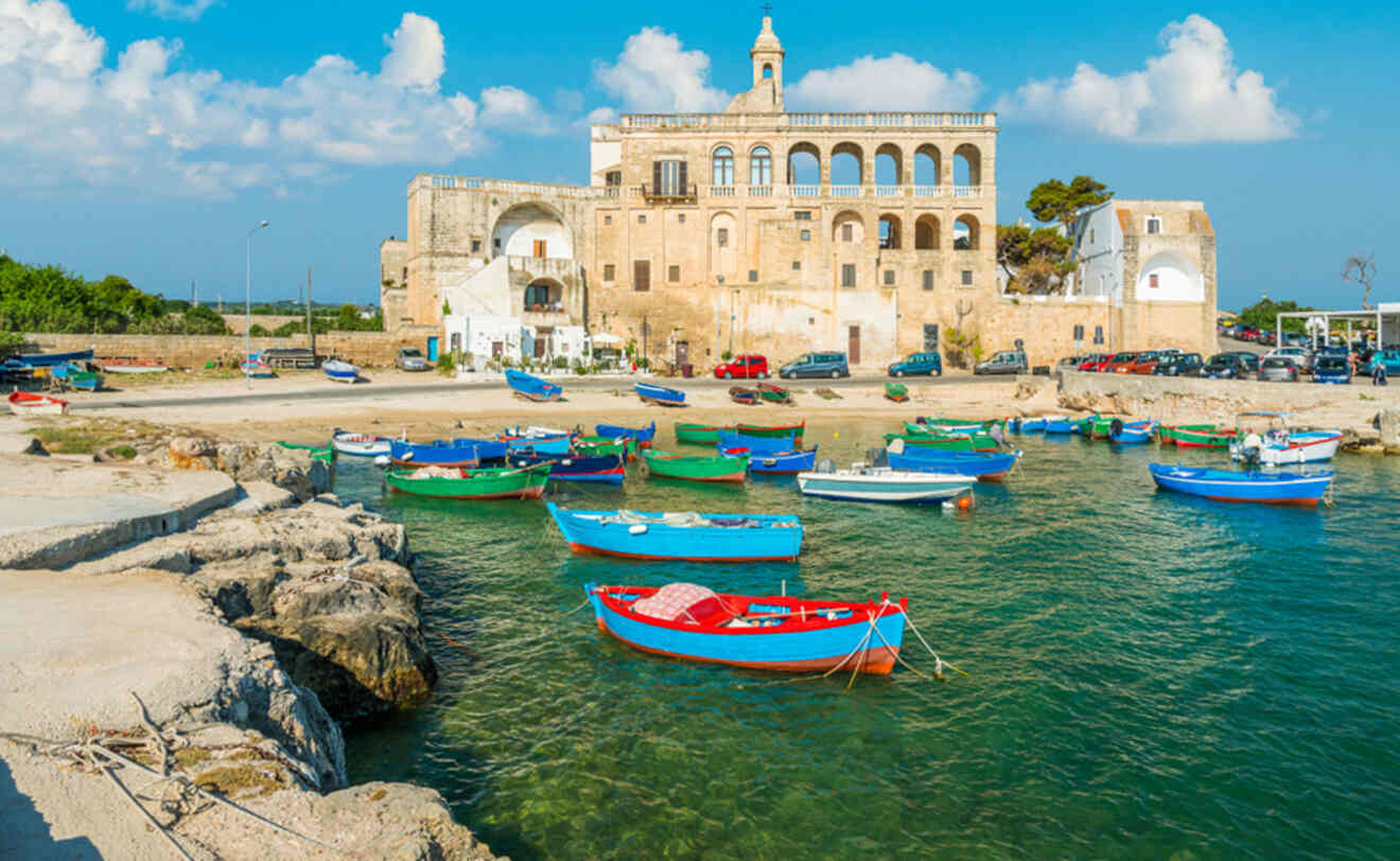 boats harbored in front of a building in the city