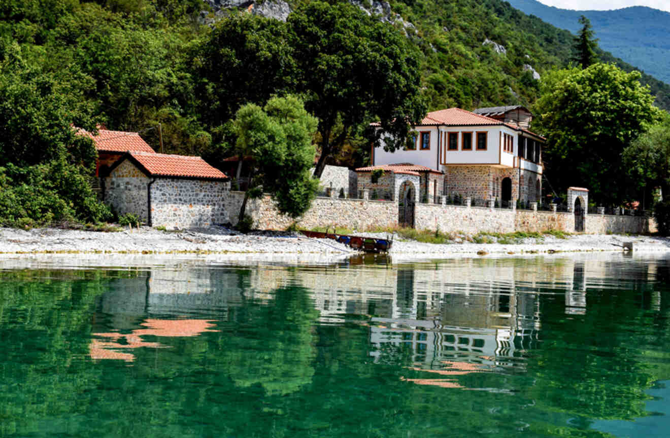 view of a church complex from the water