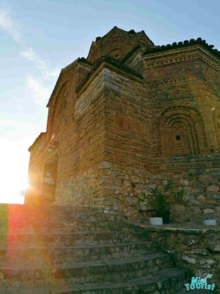 view of a church at sunset