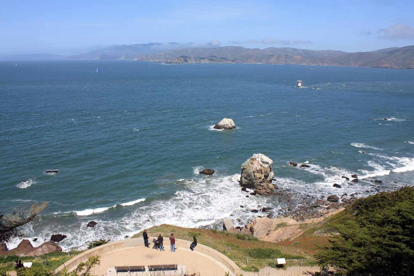 A view of the ocean from the top of a cliff.