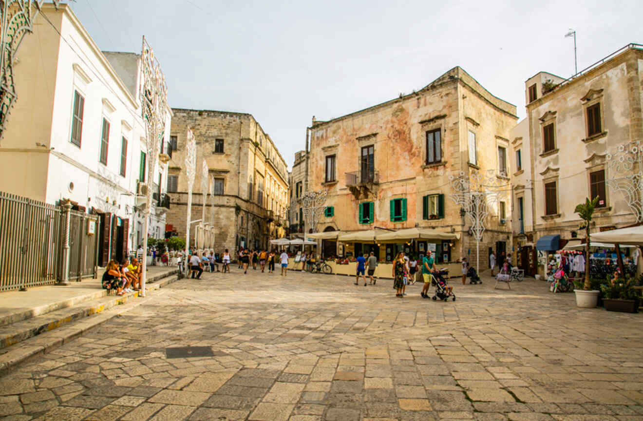 people walking around a square