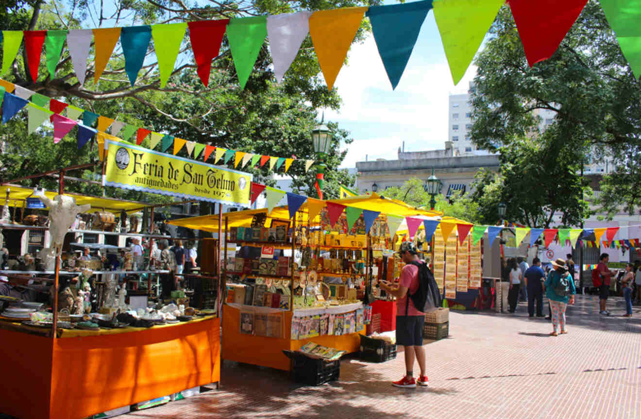 people looking at market stalls