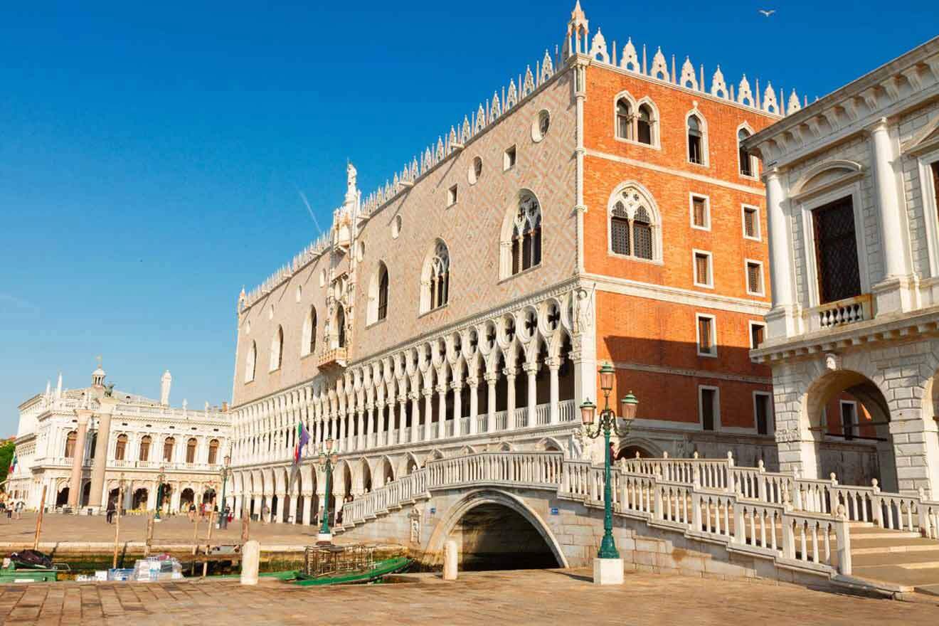 large building with a bridge over a canal