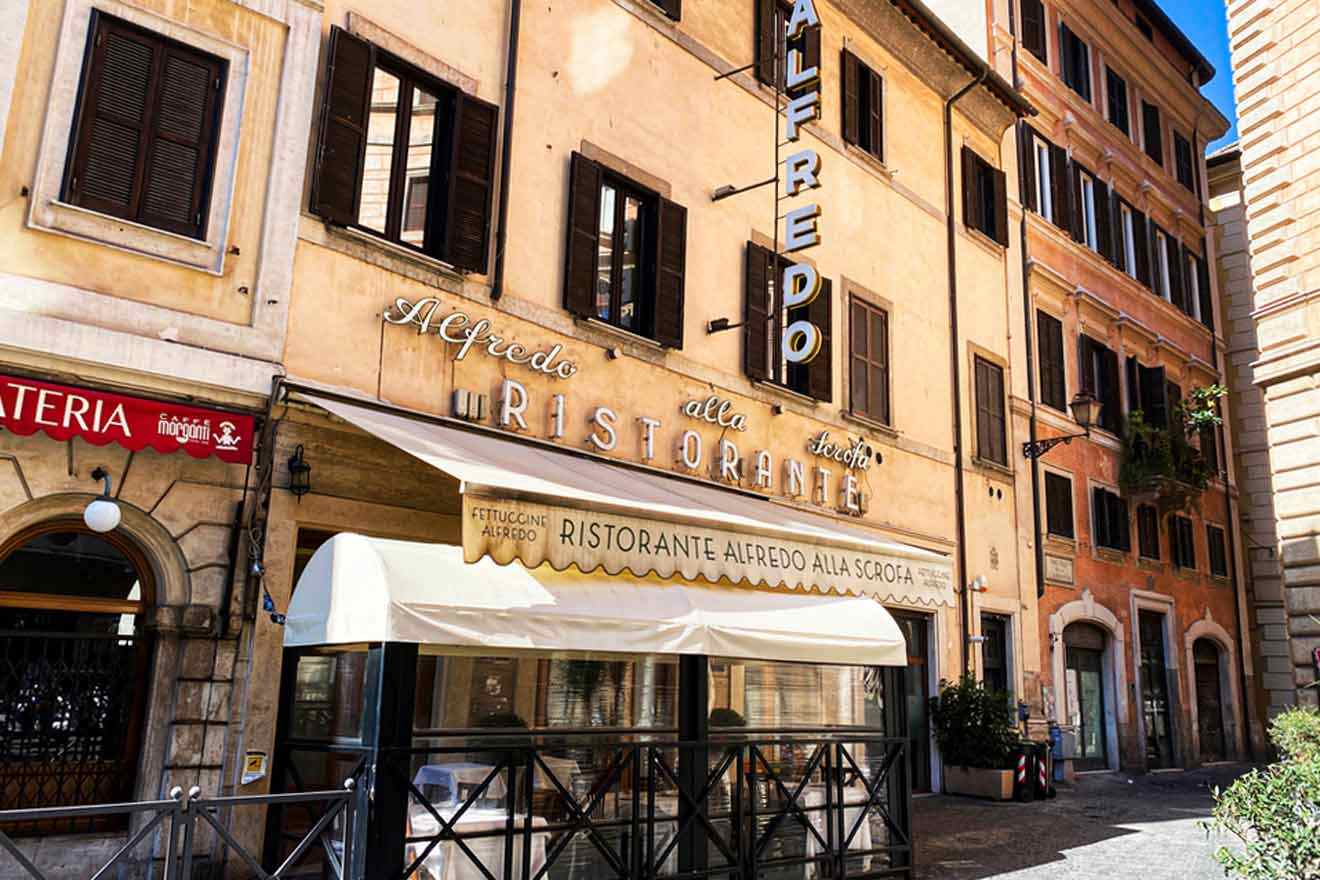 A street in rome with a restaurant in front of it.