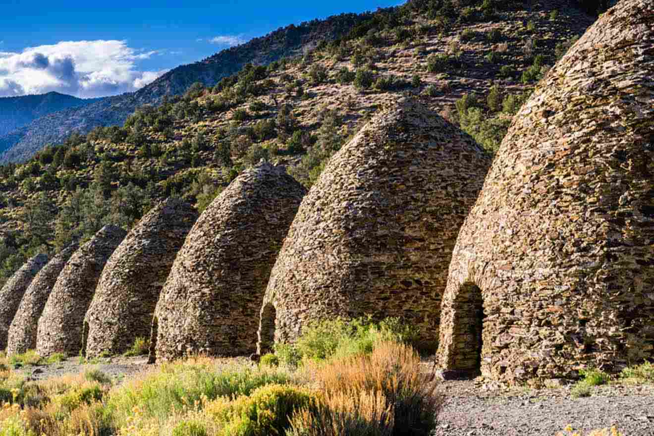 A row of stone cone constructions in the mountains.