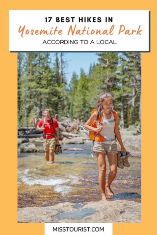 tourists walking through a river on a hike