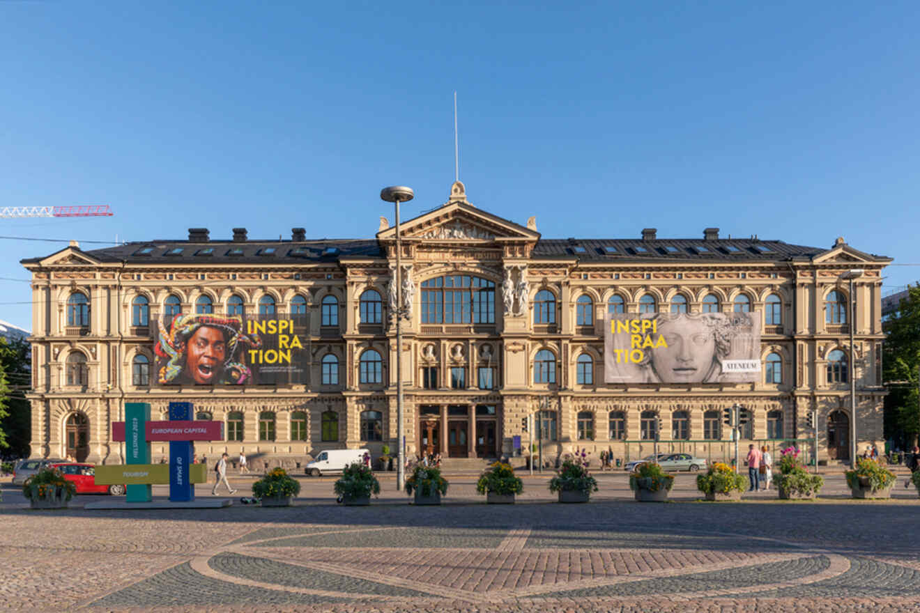 A large building with a lot of advertisements on it.