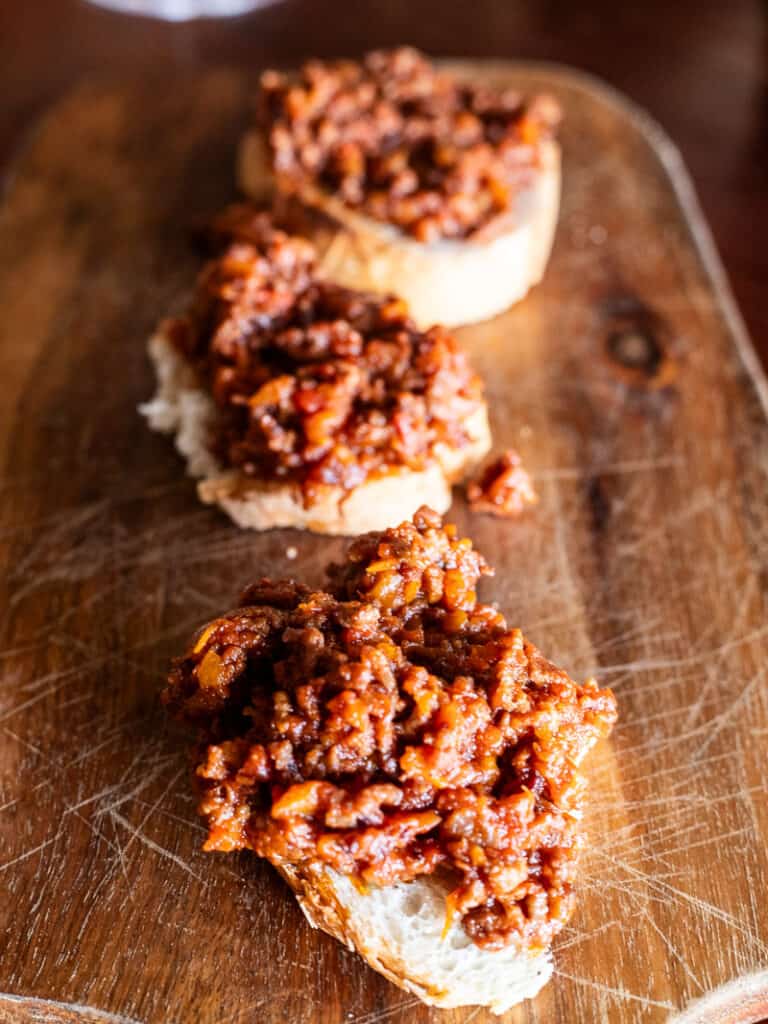 bruschetta topped with ragu