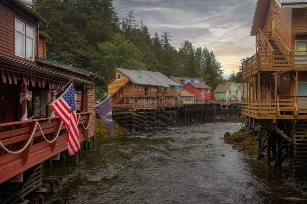 wooden homes beside river