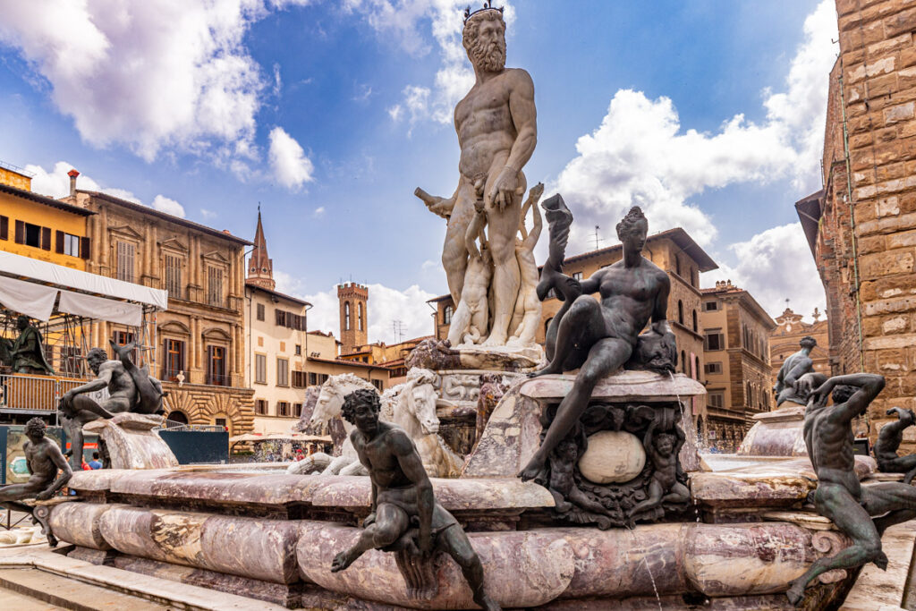 fountain with neptune in the middle 