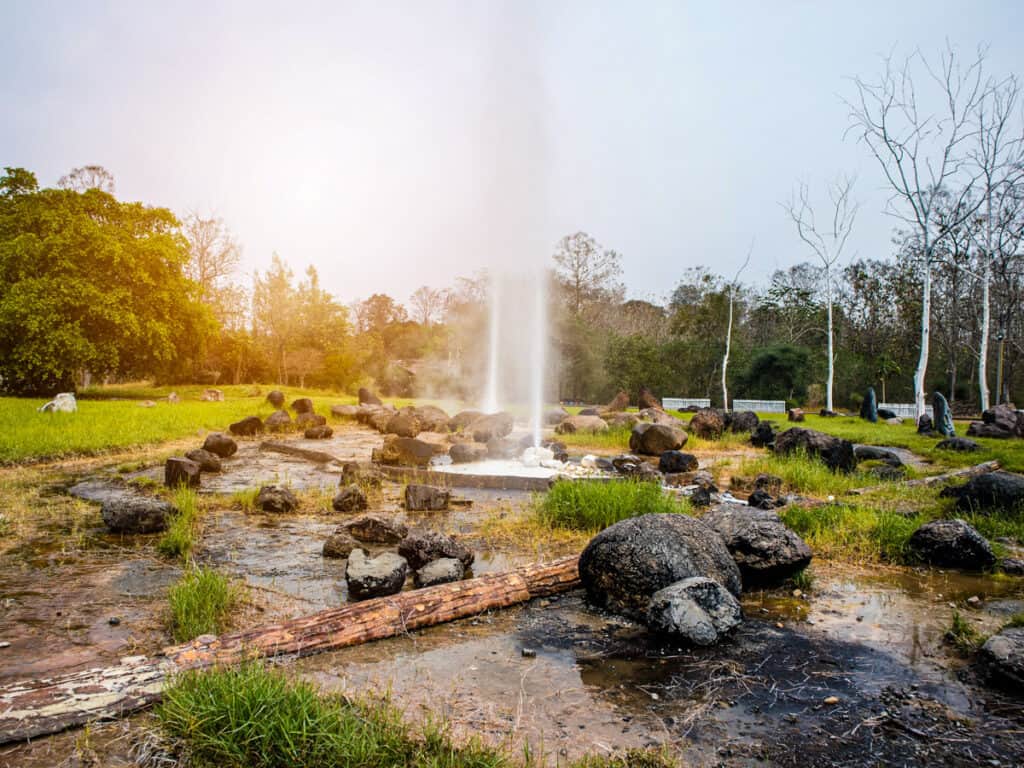 water shooting up at San Kamphaeng hot springs in Chiang Mai , Thailand