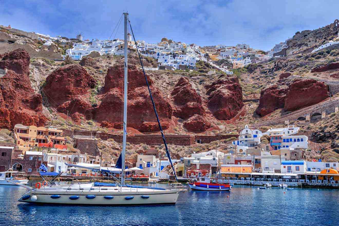 view from Santorini with boats in the foreground