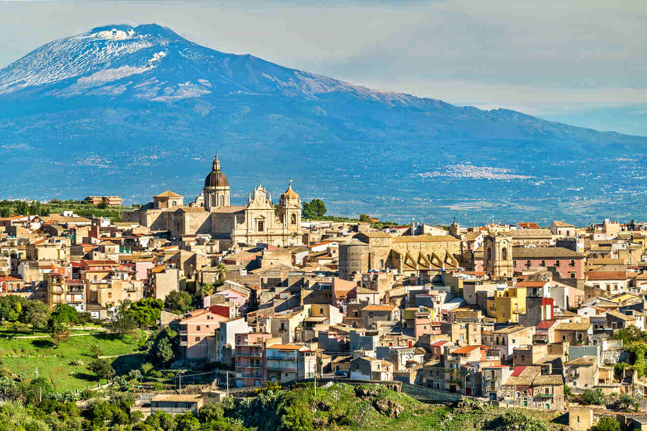 A city with a mountain in the background.