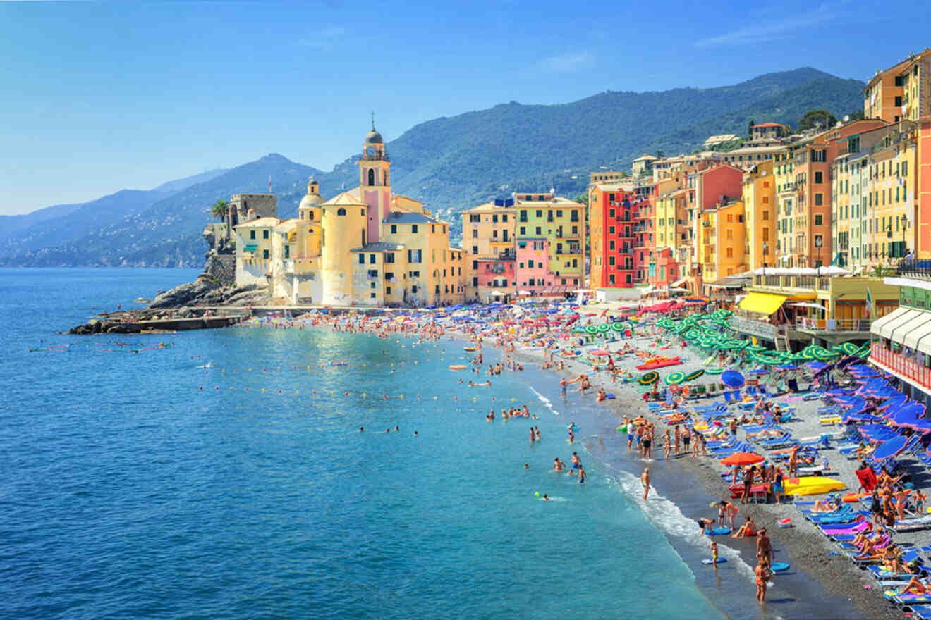 A beach with a lot of people on it.