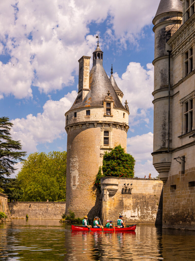 canoe on moat beside Château de Chenonceau