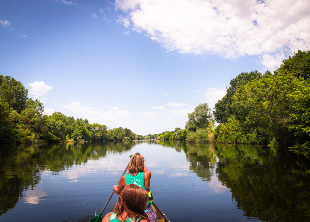 caz paddling Cher river in canoe