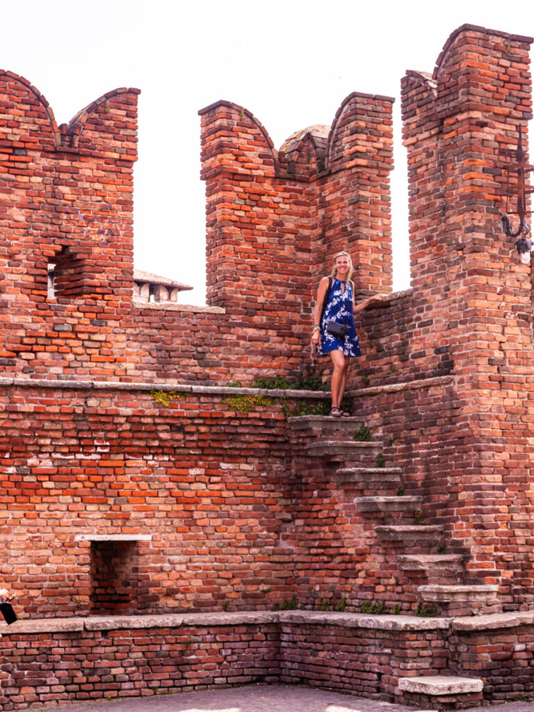 caz at top of narrow stairs on bridge