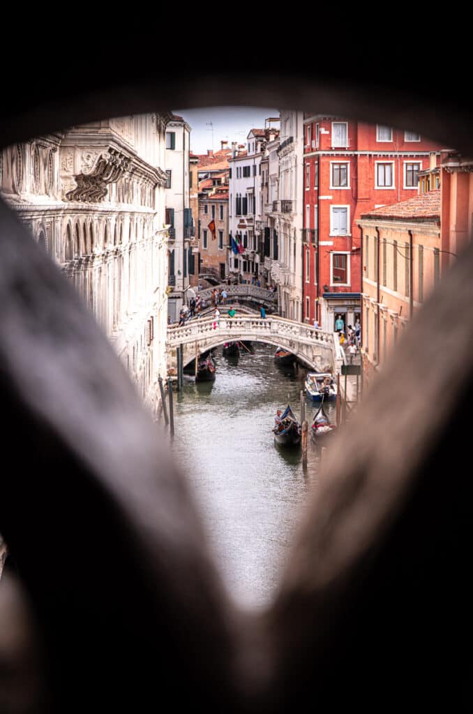 looking through  hole in bridge to venice