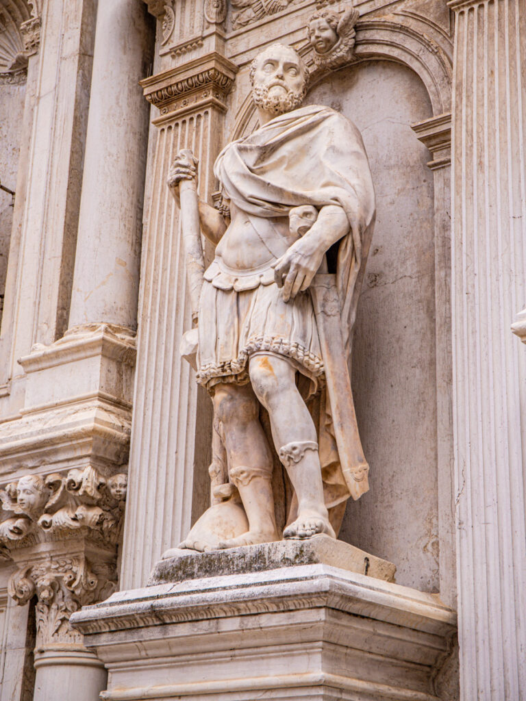 statue on exterior of palace