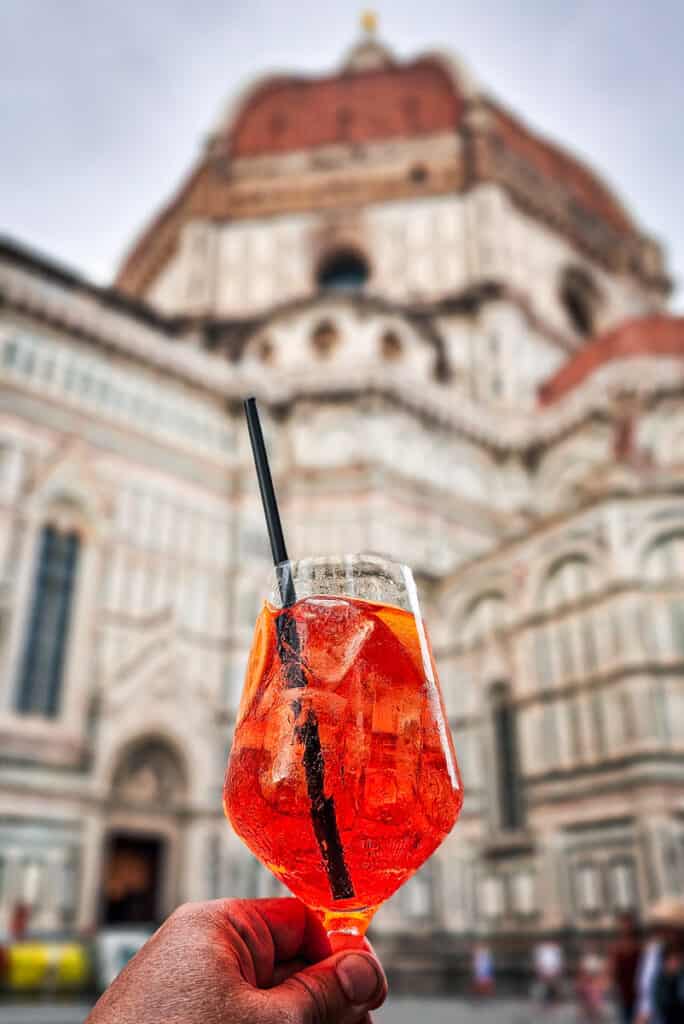 aperol spritz in front of duomo