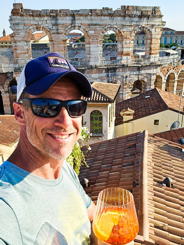 craig with aperol spritz enjoying view of  verona arena