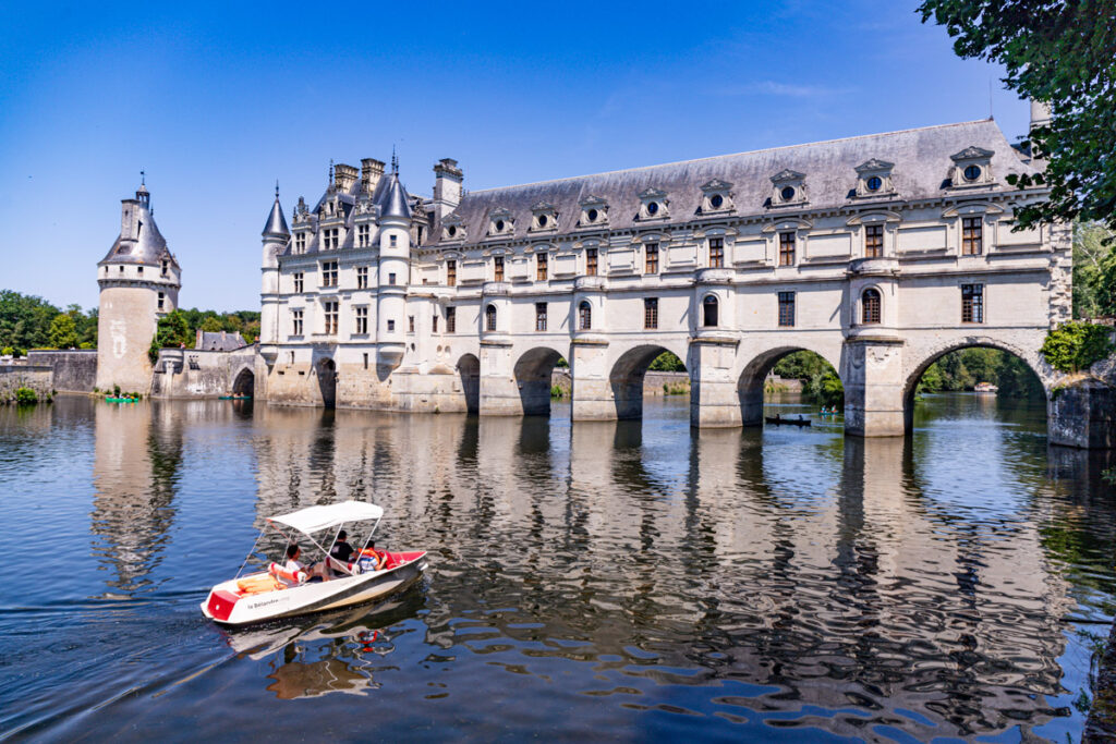 boat near castle over the river