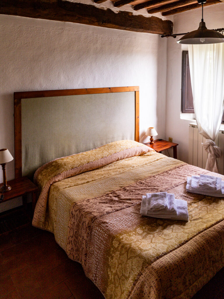 double bed in farmhouse cottage