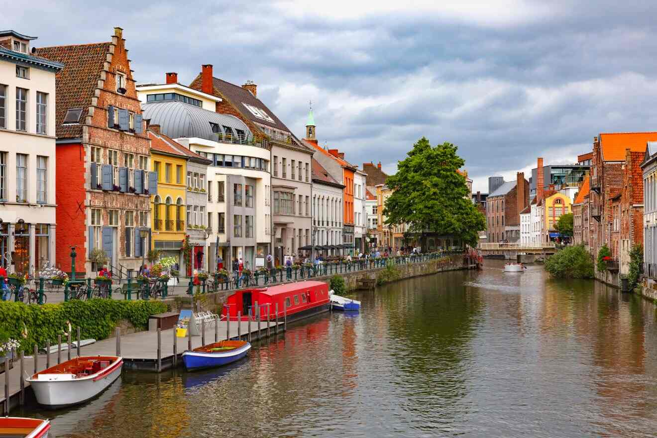 old buildings by a canal with boats