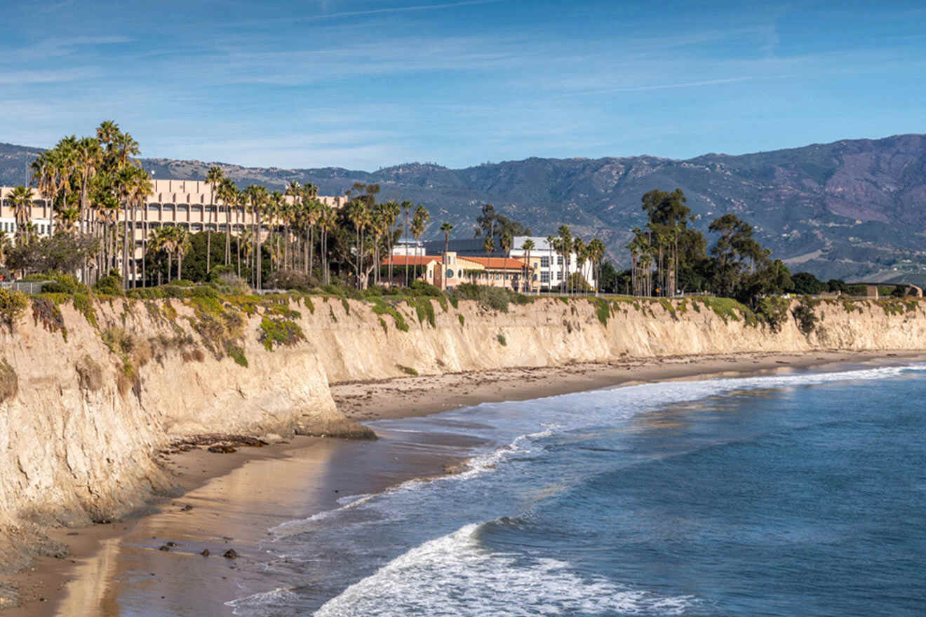 a view of a beach with mountains in the background