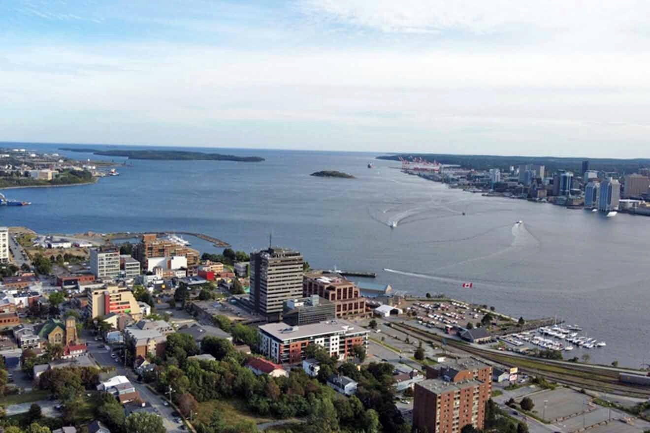 An aerial view of a city and a body of water.