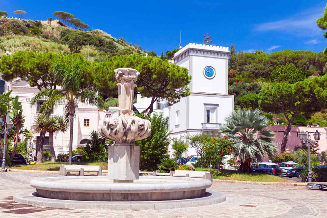 A fountain in the center of a town.