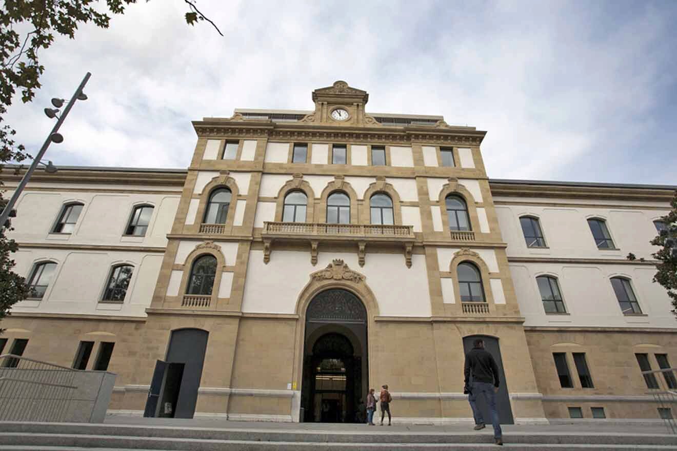 A large building with a clock on the front.