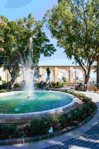 a fountain in a garden