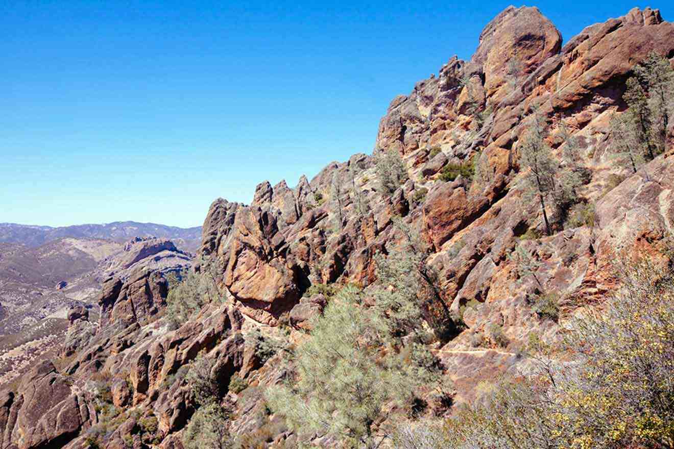 A rock formation on the side of a mountain.