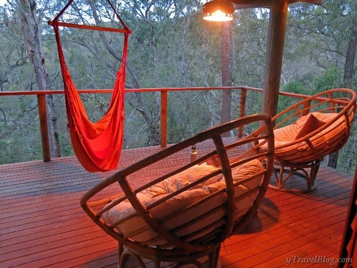 hammock on deck of yoga retreat with bush views