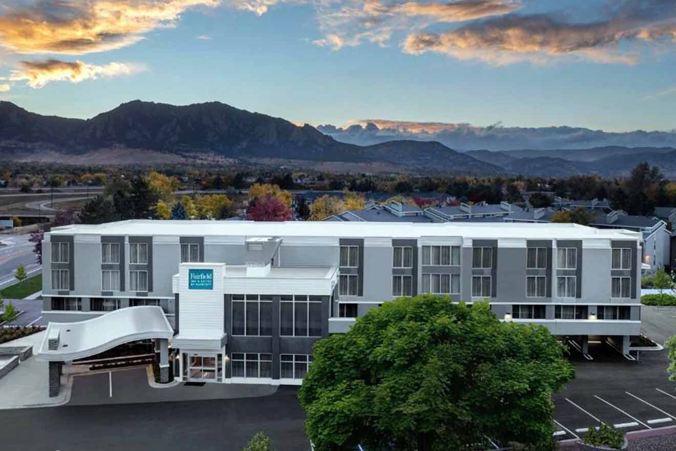 hotel's building surrounded by trees at sunset 