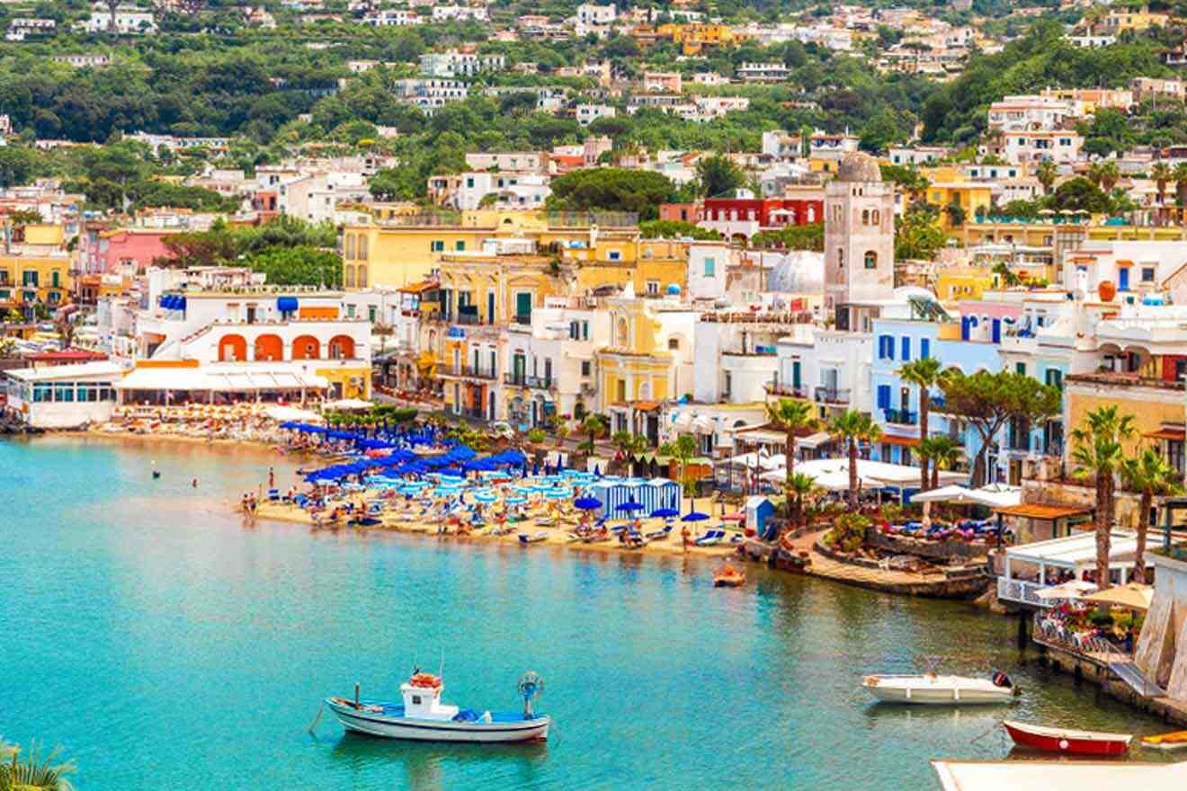 A town on the coast with boats in the water.