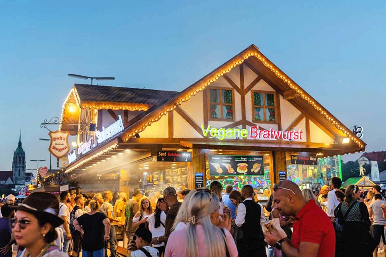 crowd of people in front of a street food shop