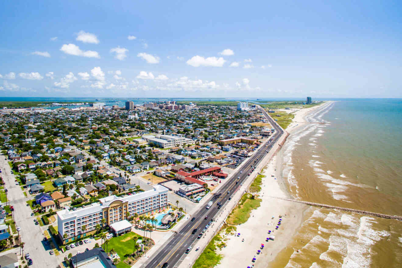 An aerial view of a city and the ocean.