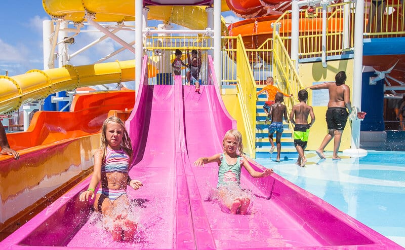 girls coming down Water slides on Carnival Vista