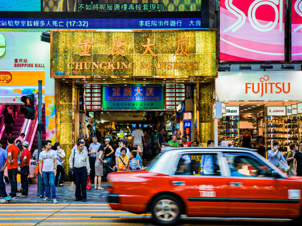 people standing outside chungking mansions