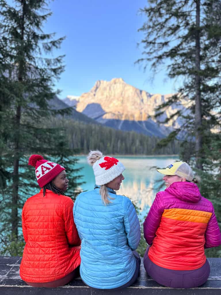 girls looking out at emerald lake views