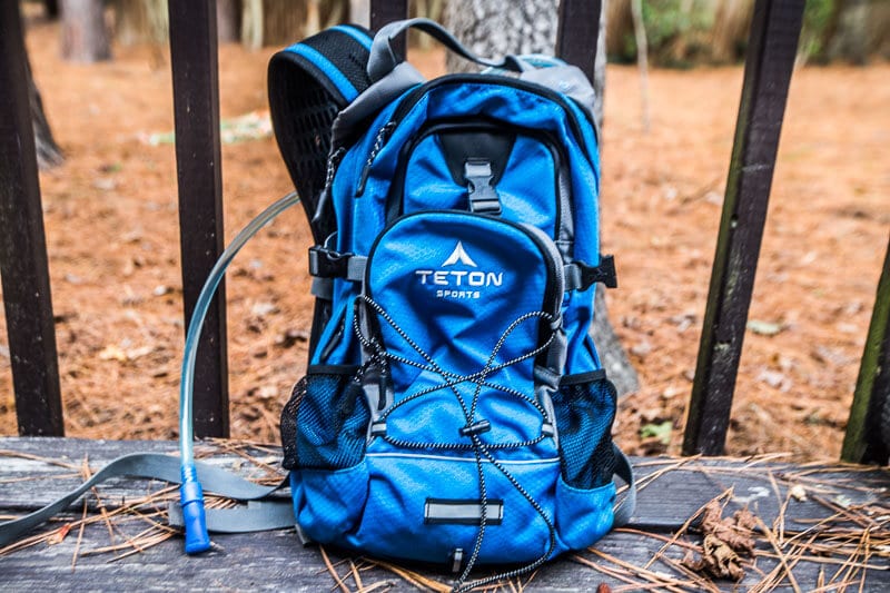 Hydration Hiking Backpack resting on ground