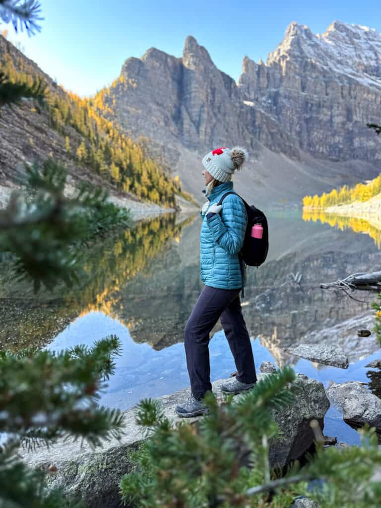 caz posing in front of lake agnes