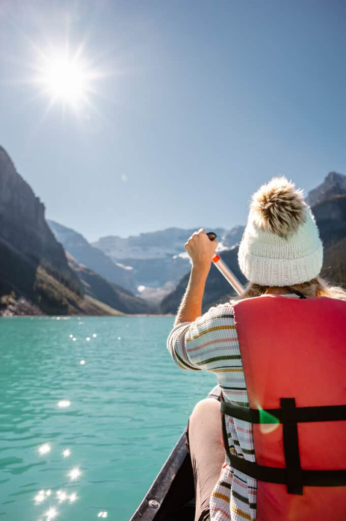 caroline canoeing on lake louise