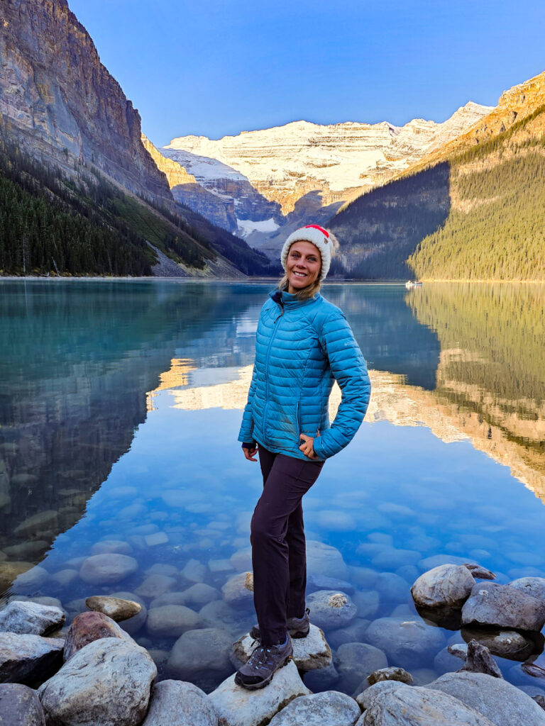 caz posing in front of lake louise